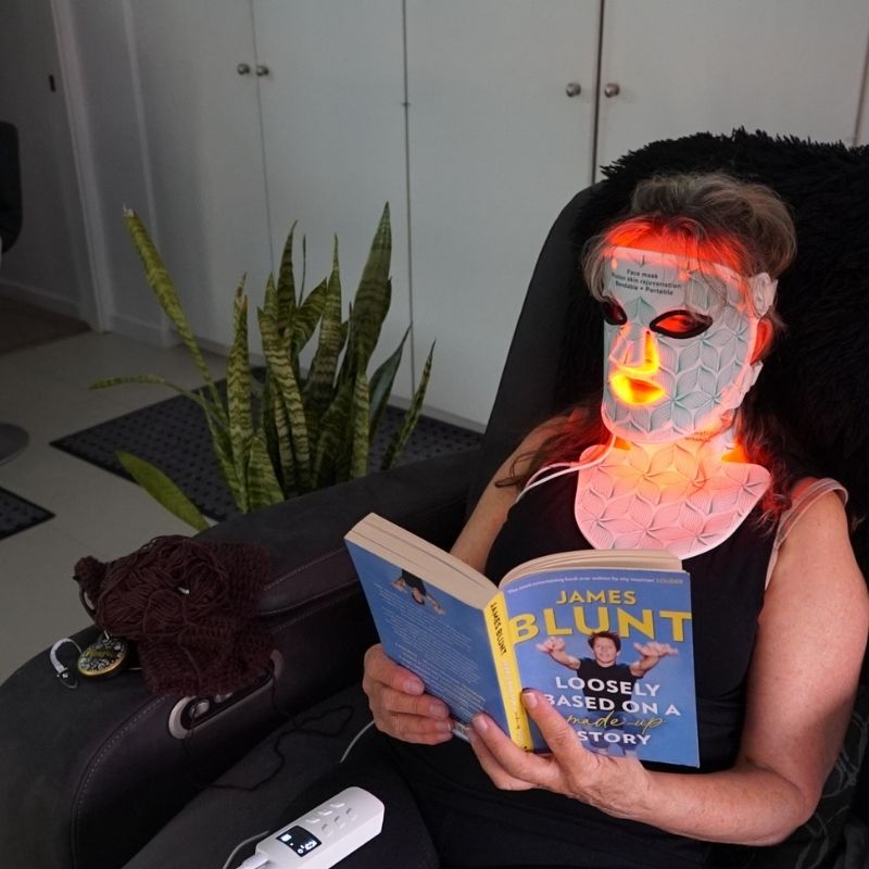 LED_Light_Therapy_Mask_with_Woman_Reading