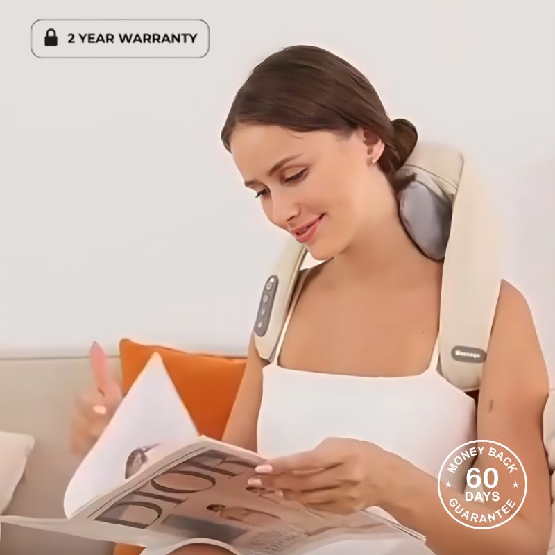 Woman Using Heated Neck Massager While Reading Book