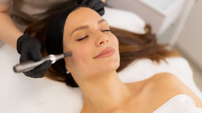 Microneedling Pen Being Used on Womans Face
