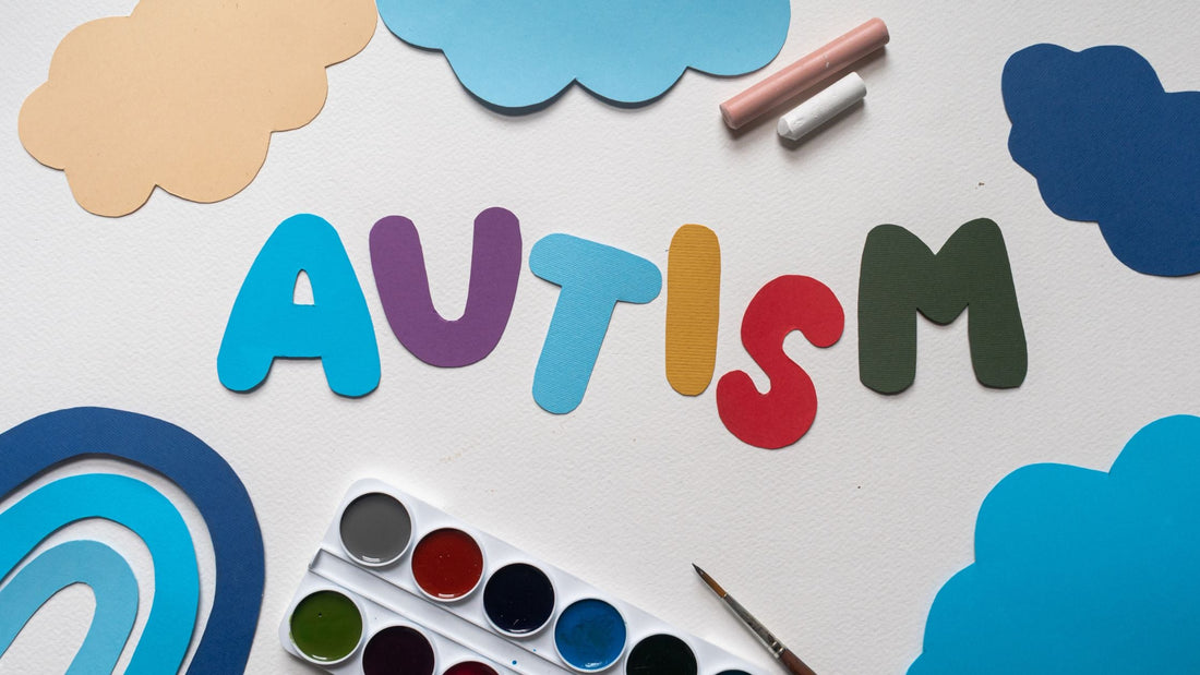 autism text in the middle of clouds and paint