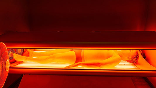 man laying inside full body red light therapy bed
