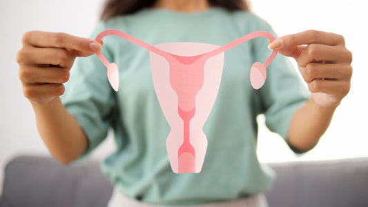 woman holding up cartoon version of vagina