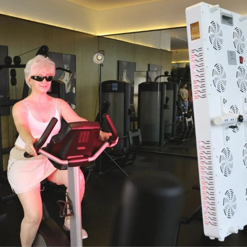 Largest_TGA_Approved_Red_Light_Panel_infront_of_lady