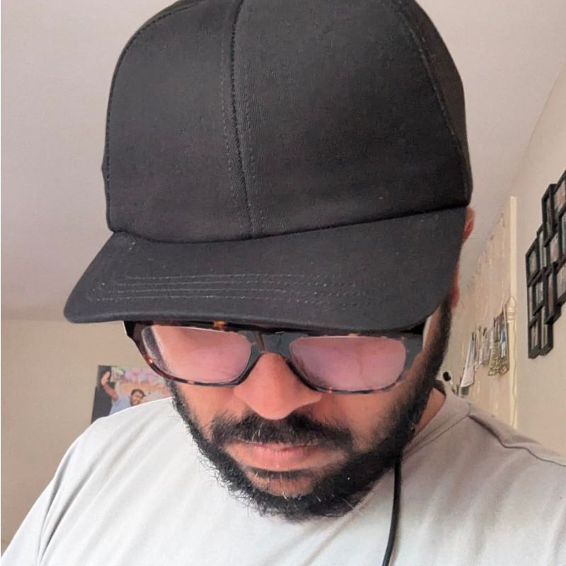Man Wearing RLT Cap