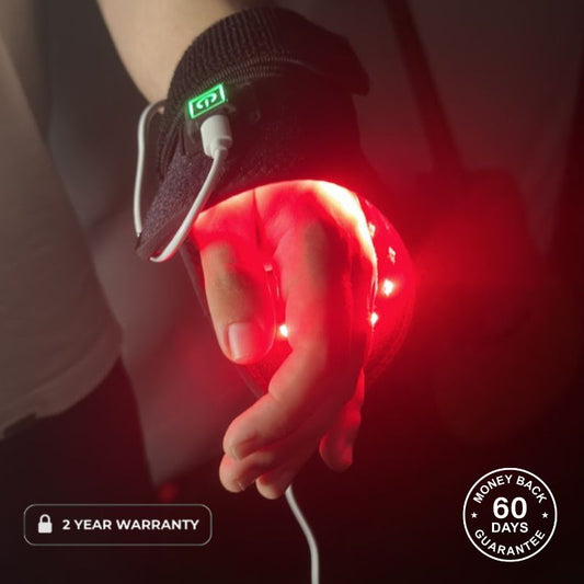 Mans Hand Wrapped Up In Red Light Therapy Pad