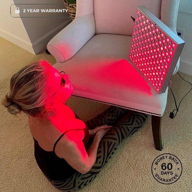 Red Light Therapy Panel On Chair With Woman Sitting