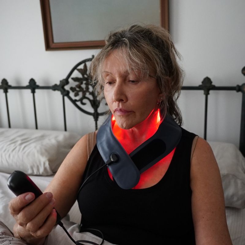 Red_Light_Therapy_for_Neck_From_Front_While_Holding_Controller