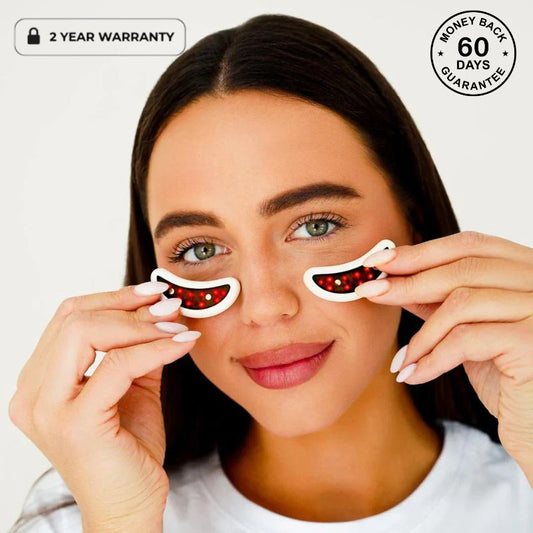 Woman Holding LED Under Eye Patches