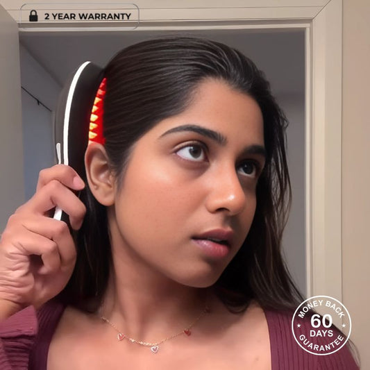Woman Holding Red Light Therapy Brush