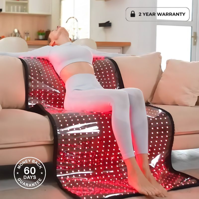 Woman Laying On Red Light Therapy Mat