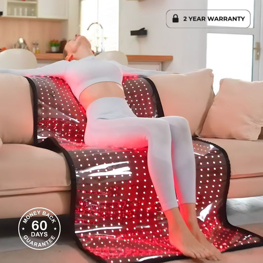 Woman Laying On Red Light Therapy Mat