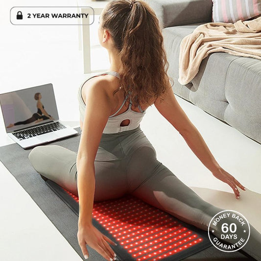 Woman Stretching On Red Light Therapy Mat