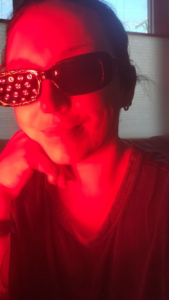 Woman Using Red Light Panel White