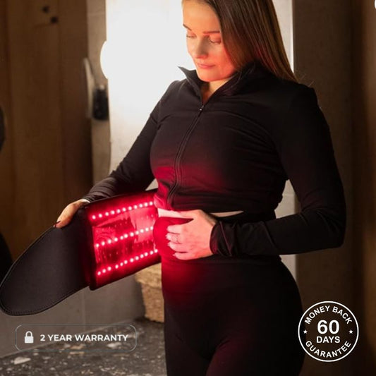 Woman Wrapping Red Light Therapy Belt Around Waist