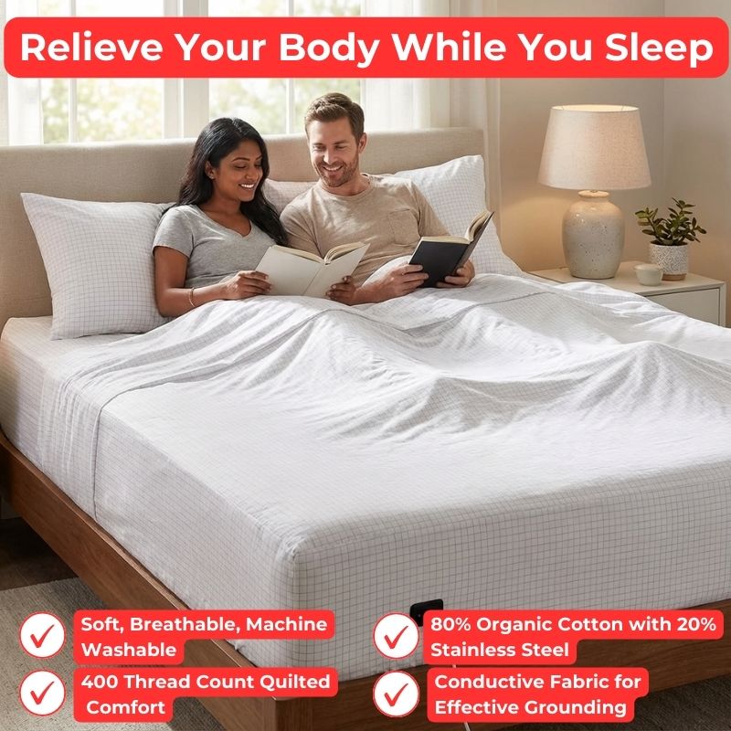 couple laying on bed with stainless steel thread