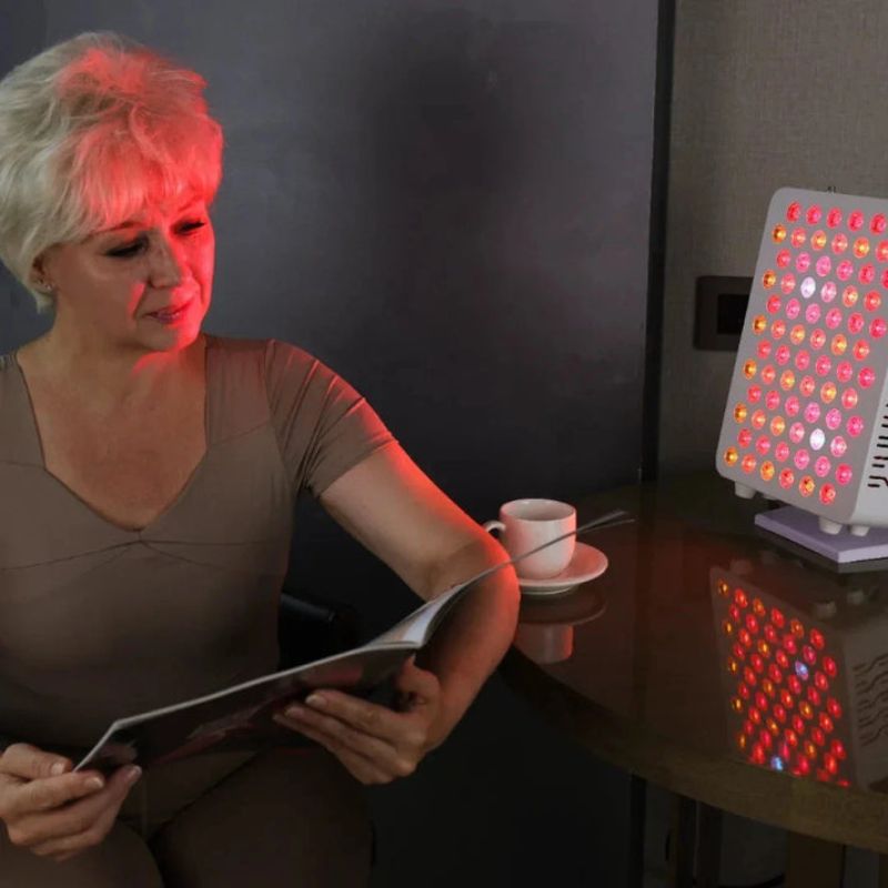 medicalgraderedlighttherapypanelss100withladyreading