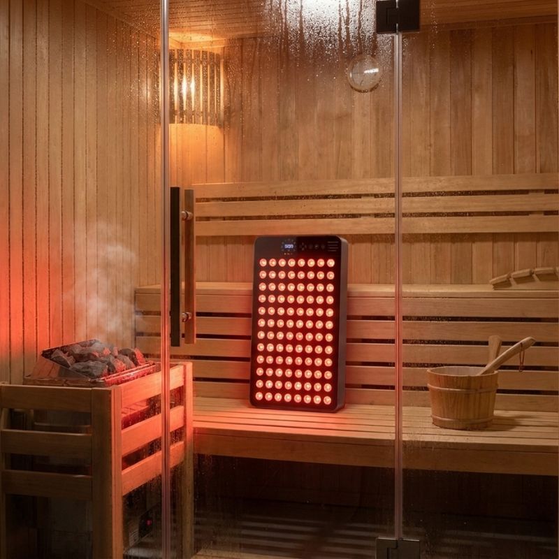 red_light_therapy_sauna_panel_inside_of_sauna_standing_up_and_lit_up