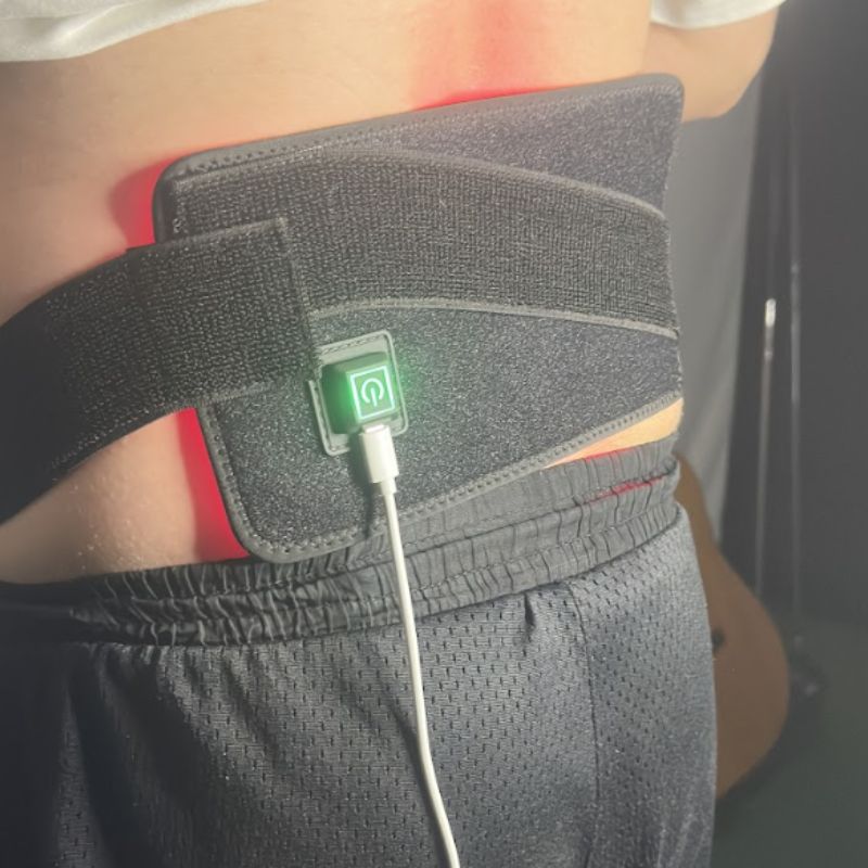 red_light_therapy_wrap_around_mans_back_far_view_49164de9-dd0a-4792-a9f7-b0fc1431e34f