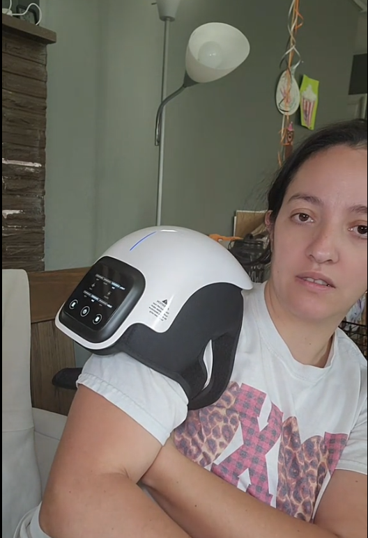 shoulder massager with heat on woman