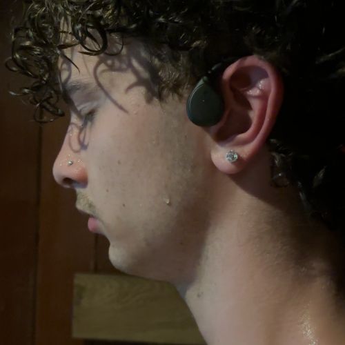 waterproof earbuds for swimming in black in use