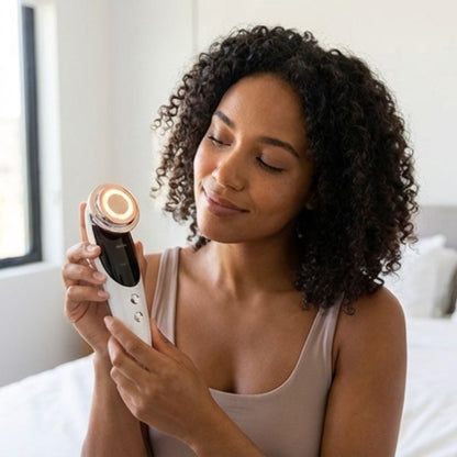 woman_holding_radio_frequency_machine_with_red_light_emitting_from_it